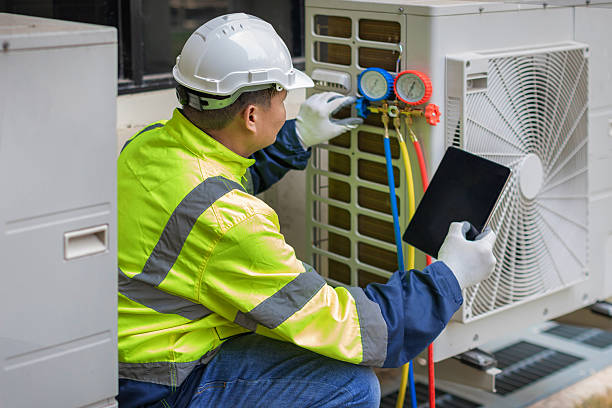 Professional Hvac technician working in Mastic Beach, NY